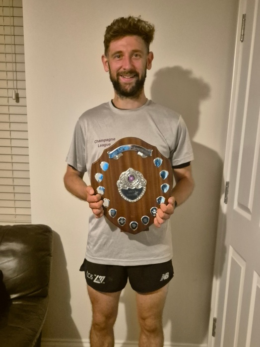 Stuart holds the Peter Jarvis Memorial Trophy