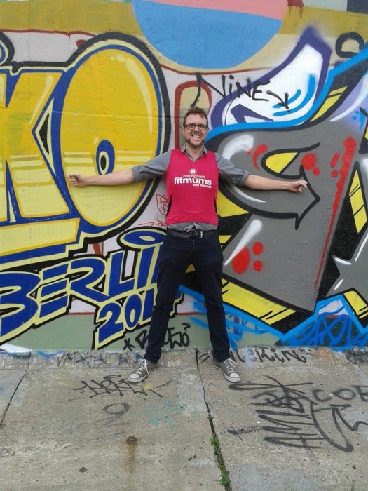 Chris at the Berlin Wall