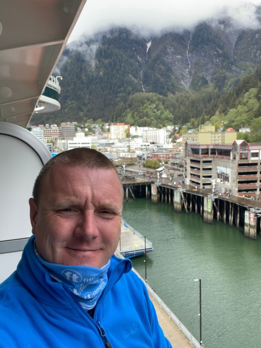 Charlie using his snood to keep warm in Alaska.