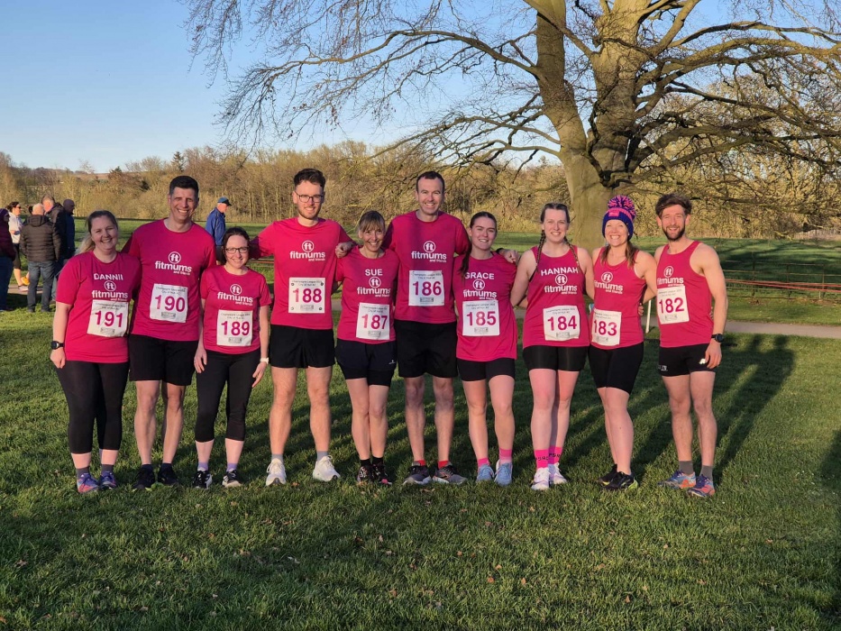 ten Fitmums and Friends stood in a line before a Champagne League race.