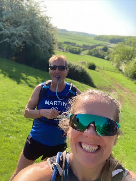 Martin and a female friend in the countryside.